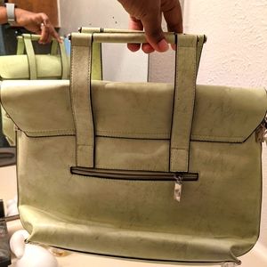 Unique green hand bag in pristine condition.